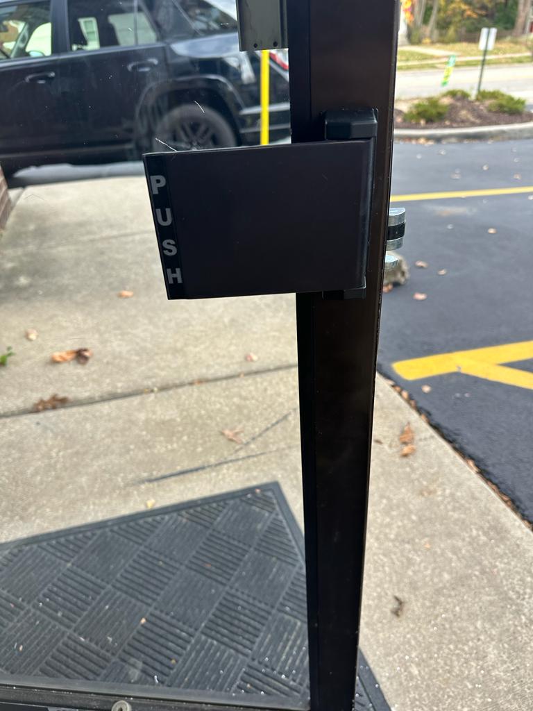 Paddle handle installation in Willoughby OH on a business door (1)